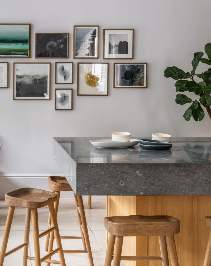 bar area at inhabit hotel with decorative photo wall