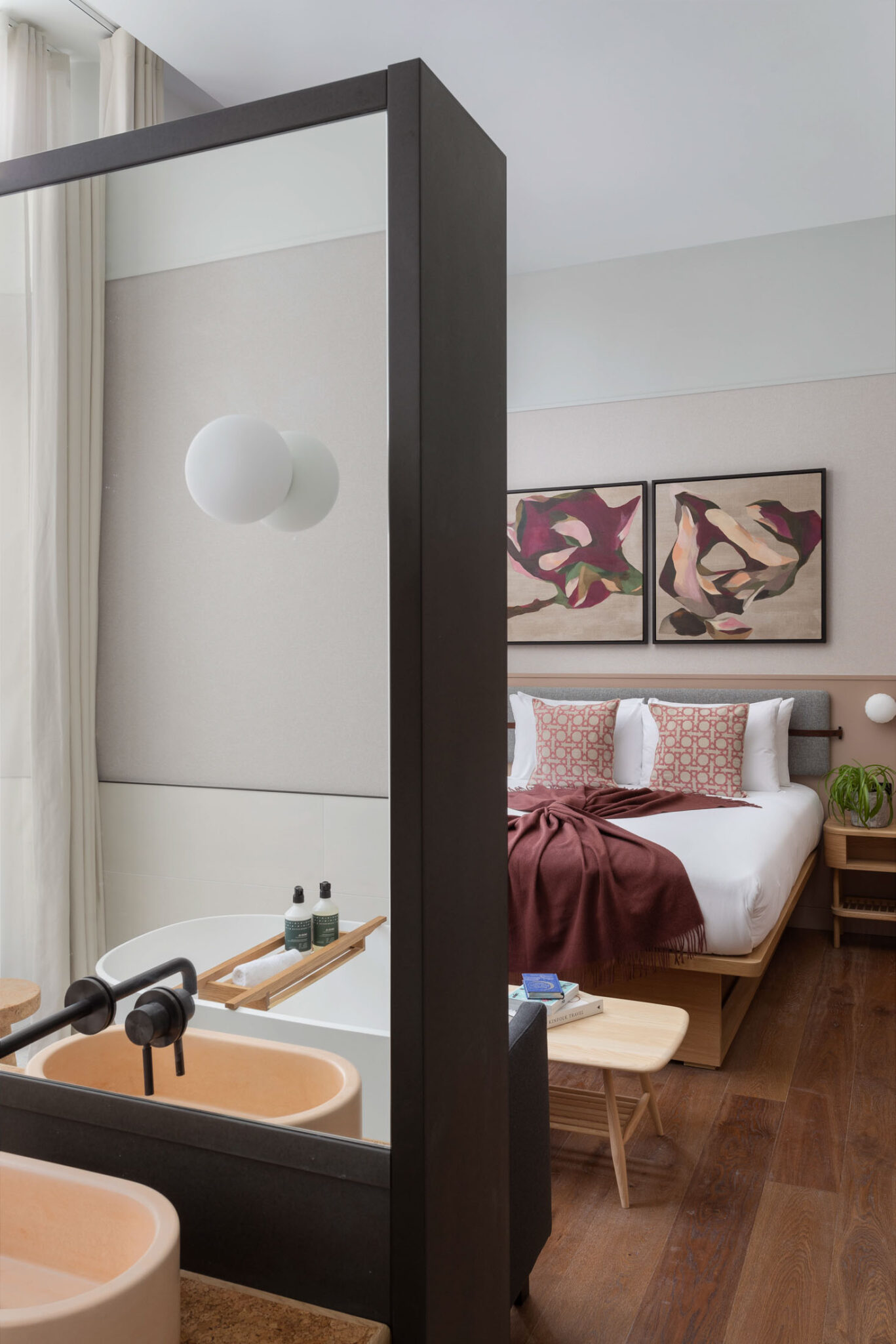 Bedroom and bathroom at Inhabit Queens Gardens