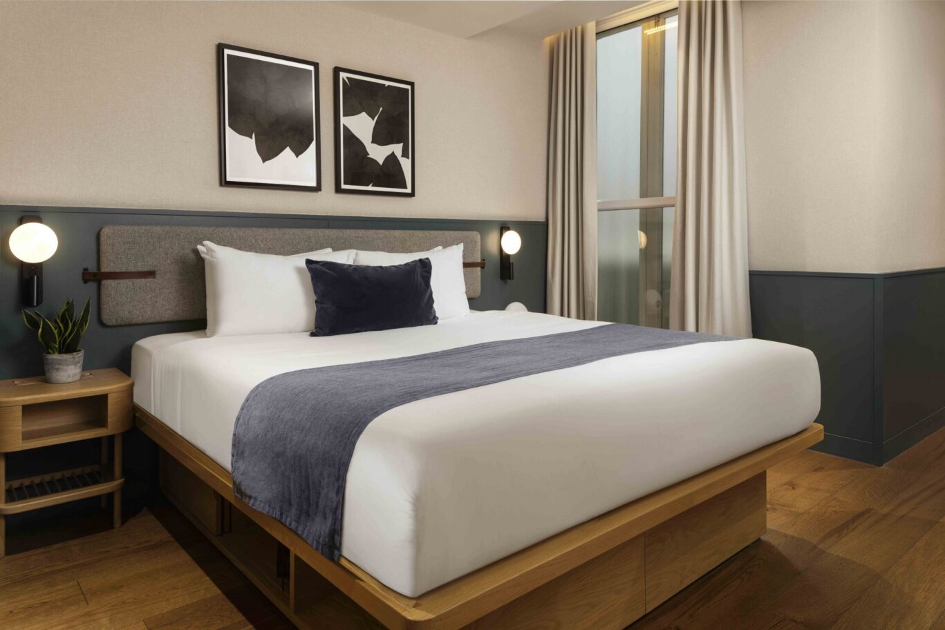 Super Roomy bedroom at Inhabit Queen's Gardens hotel